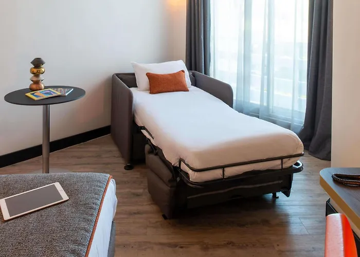 Novotel Motte Golf Отель
