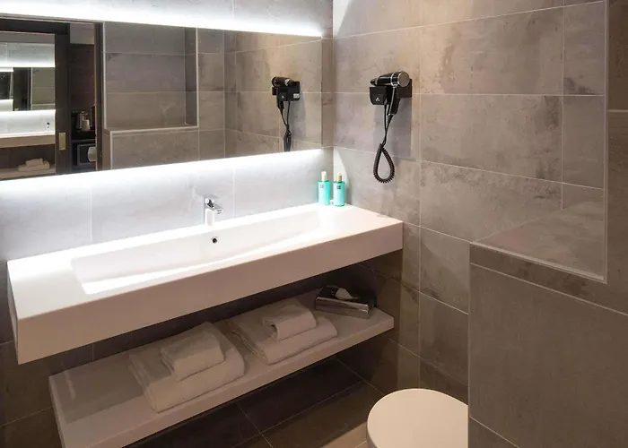 Novotel Motte Golf Отель